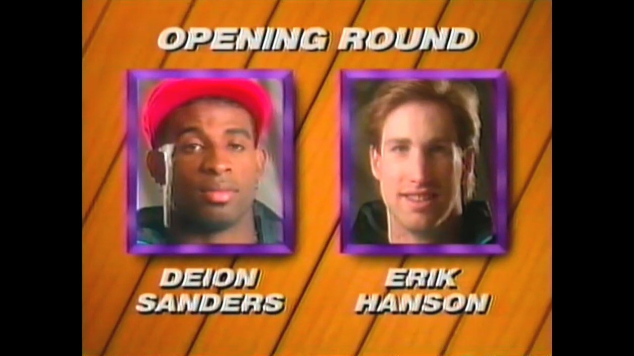 Mariners Pitcher Erik Hanson Battles Deion Sanders in a Dunk Contest
