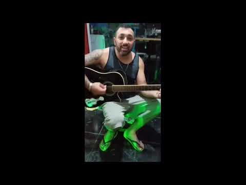 Fernando Lima tocando violão