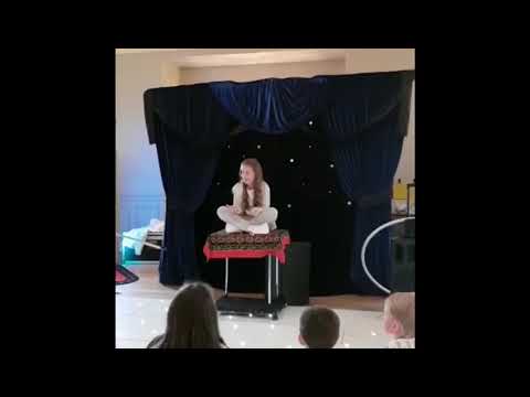 Carl Campbell Magician Flying Carpet illusion