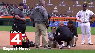 Detroit Tigers groundskeeper flips off camera while being attended to by medical staff