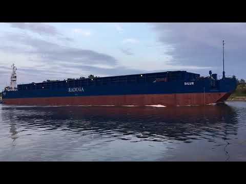 Raduga Proton with barge Silur passing Liepaja bridge