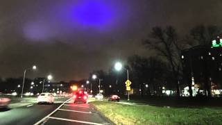 Blue light in night sky, Queens, NYC