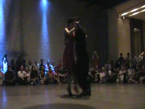  Esteban Moreno  and  Claudia Codega  are  dancing  to  a  tango