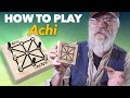 Achi - a three-in-a-row game from Ghana.