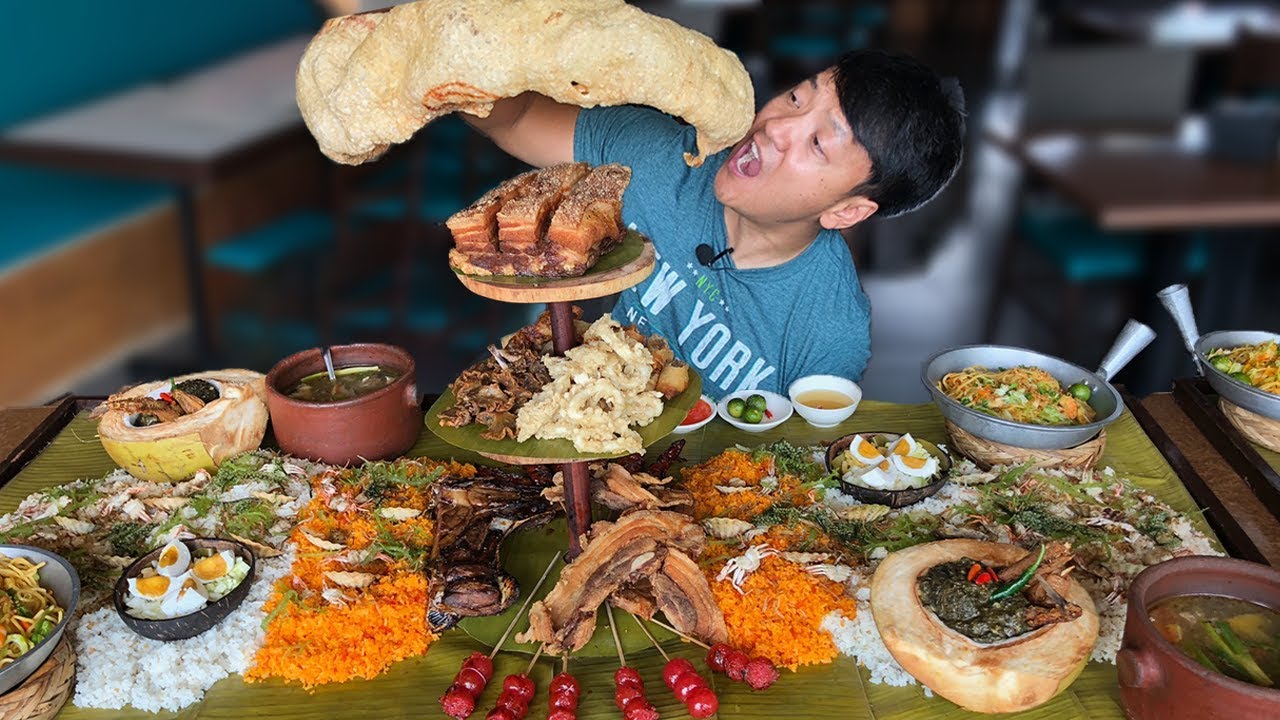 MASSIVE Filipino FOOD BATTLE! Over 50 DISHES! Boodle Fight!