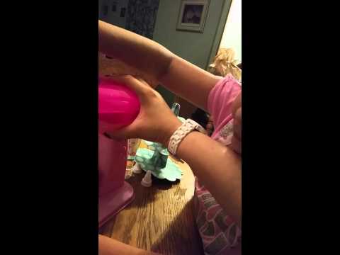 Jezebelle making her first cake (tiny)