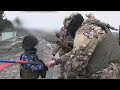 Мальчик из освобожденного пункта Троицкое ежедневно встречает солдат Российской армии  с триколором