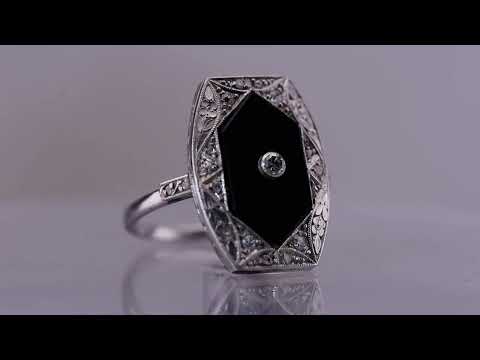 ANTIQUE RAYMOND YARD PLATINUM DIAMOND AND ONYX RING