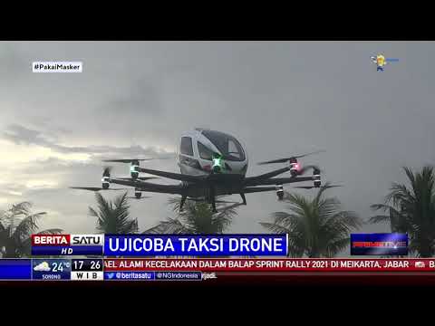 , title : 'Drone Taksi Angkut Dua Penumpang Uji Coba di Bali'