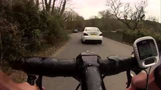 preview picture of video 'Cyclist Chasing Supercharged Lexus and BMW in Liskeard - 48mph'