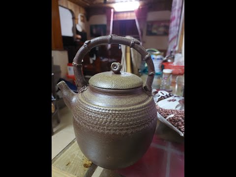 Ấm pha trà tươi nước sôi nước lá mát