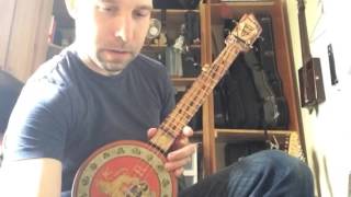 The Lion - homemade cookie tin banjo