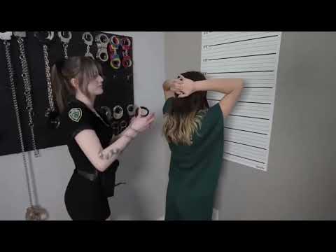 Girl Handcuffed and Shackled in Prison