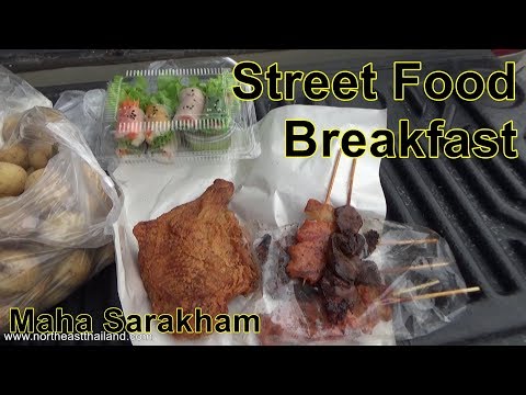 The cost of Thai street Food in Northeast Thailand, Buying breakfast in the morning wet market.
