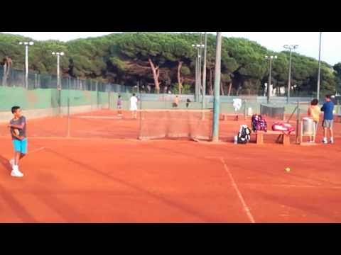 Playing tennis at Andres Gimeno