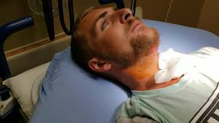 Draining a painful abscess on the upper throat