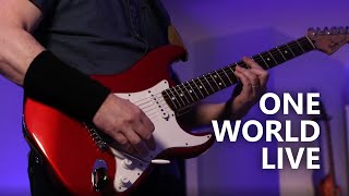 One World Live cover - Dire Straits