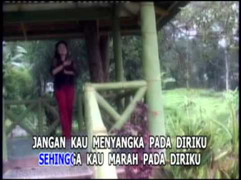 Lirik lagu Rita Sugiarto dan video karaoke Kumpulan 