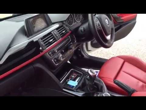 12 12 BMW 318d Sport 4-Door