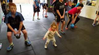 Little miss Freya giving it socks in Trx "insanity fitzone"
