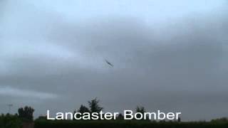 preview picture of video 'Rippingale Feast 2013 - Flypast - Cropped Wing Spitfire and Lancaster Bomber'