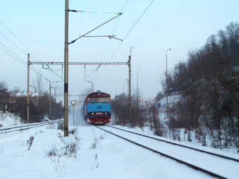 749 260 na čele os. 9055 - Praha Vršovice zastávka - 18.12.2010.