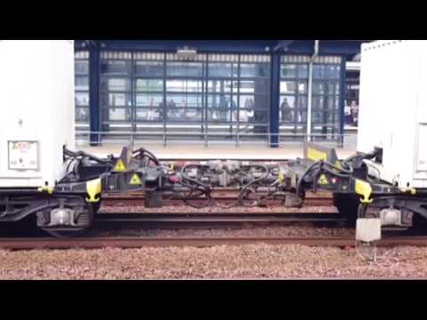 Gb 66732 leads barrier wagons through Ashford with barrier wagons bound for Dollands Moor