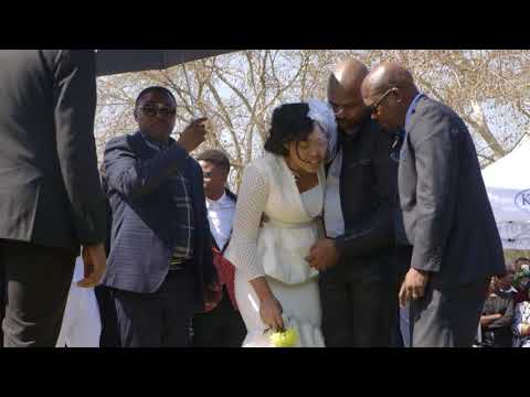 Dumisani Masilela's wife breaks down at husband's grave