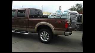 2011 F250 Super Duty being loaded with 3465lbs of Marble Rock