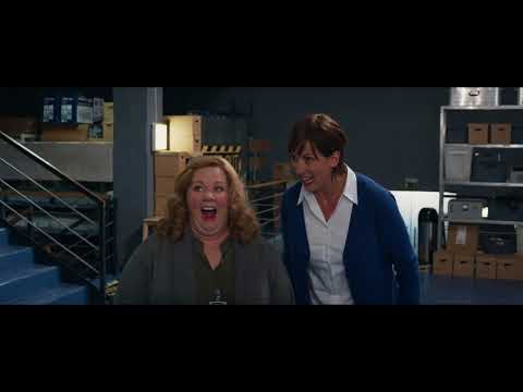 Spy (2015) trailer still — Melissa McCarthy’s Susan Cooper framed like a classic 007 title card