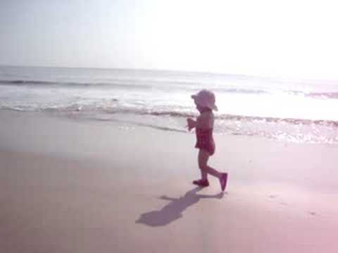 Ansley playing on the beach