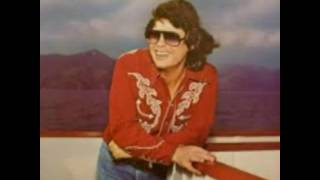 Ronnie Milsap She Keeps The Home Fires Burning.
