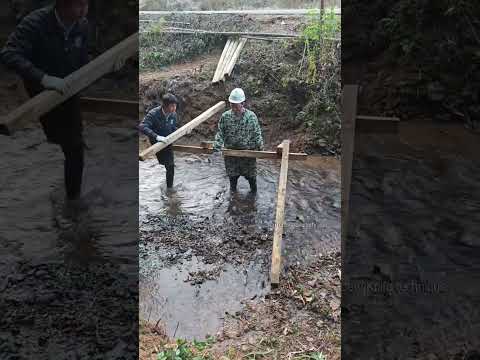 DIY Tutorial for building a wooden bridge over a stream