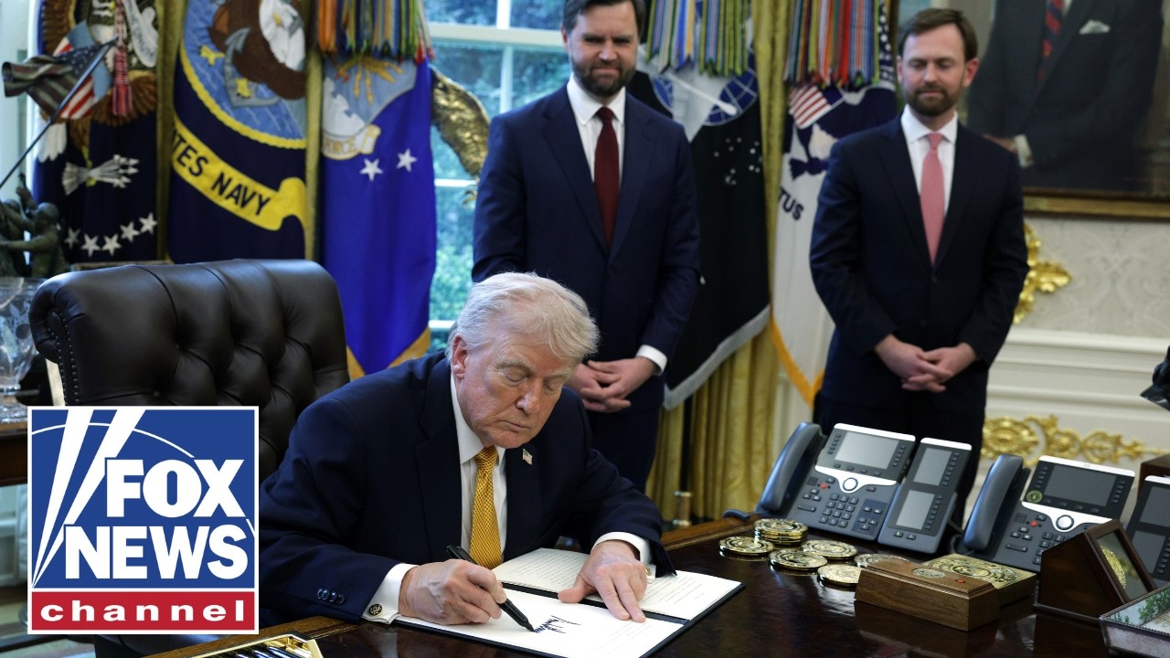 WATCH: Trump signs executive order from the Oval Office