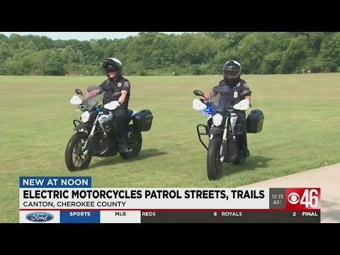 Electric motorcycles patrol streets, trails