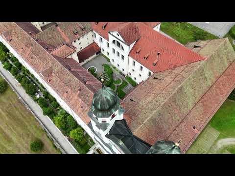 Disentis/Mustér with the old abbey in the anterior rhine valley (Switzerland)