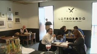 Spain jobless restaurant customers work rather than pay the bill