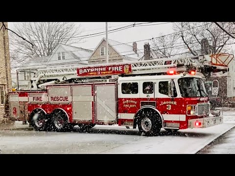 BAYONNE FIRE DEPARTMENT LADDER 3 RESPONDING FROM QUARTERS ON AVENUE B IN BAYONNE, NEW JERSEY.