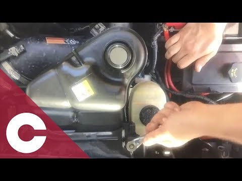 Replacing Coolant Reservoir on a Ford F250 by Doug Mandell