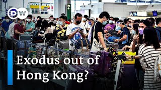 Could Hong Kong's new immigration law ban residents from leaving? | DW News