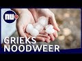 Mensen schuilen voor enorme hagelstenen in Grieks café | NU.nl