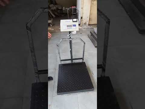 Weighing machine with printer
