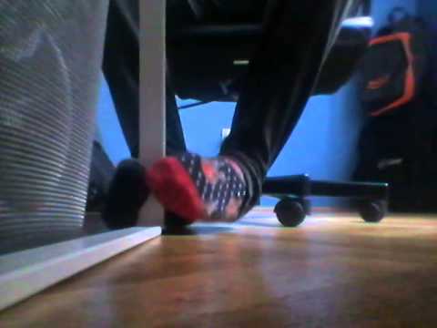Mismatched socks under desk
