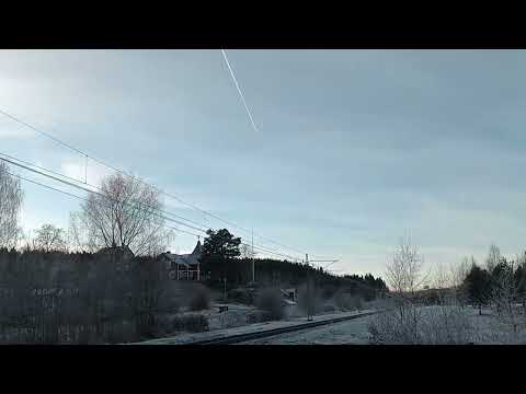 Sweden, Deje, Älvdalsvägen, Green Cargo freight train passing by Deje 