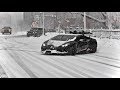 Huracan Performante Drifting In Snow Storm Snowboarding Behind The Lambo