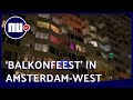 Amsterdam West zingt You'll Never Walk Alone tijdens 'balkonfeest' | NU.nl