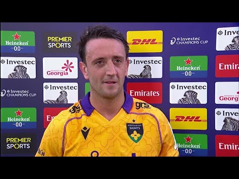 Northampton Saints' Alex Mitchell reacts to beating Pau away in Champions Cup