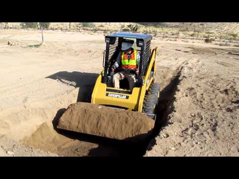 HeoHopkins-Loading Dump truck with SkidSteer