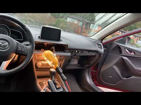 Installing replacement infotainment system on 2015 Mazda 3 (time lapse)