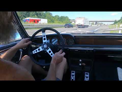 1972 BMW 3.0 CSI E9 driving on german Autobahn